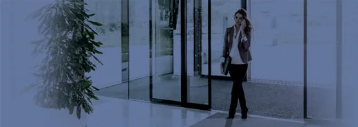 Automatic sliding door and tripod turnstile installed at an office entrance in Indore