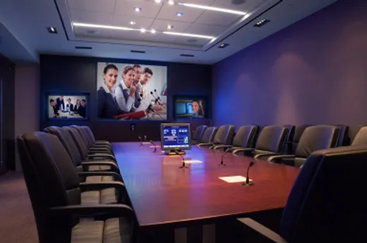 Boardroom with video conferencing and LED display set up for an office in Indore